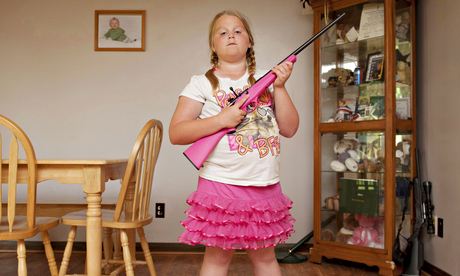 Abby, aged 8, from Louisiana, photographed by   An-Sofie Kesteleyn for her series My Little Rifle