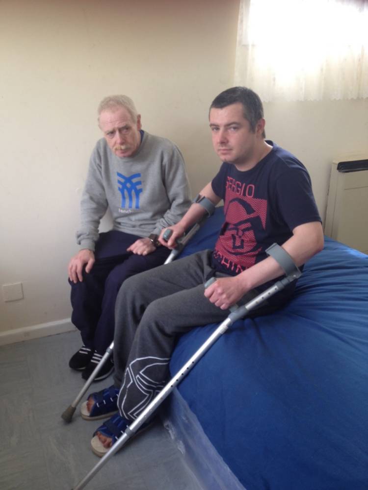 Keith and Mitchell Keenan from Skelmersdale, West Lancashire. Mitchell had to have his toes amputated after contracting frostbite while living in a tent. The family blames the government's bedroom tax.