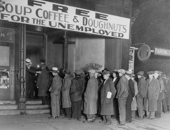 16 Nov 1930, Chicago, Illinois, USA --- Notorious gangster Al Capone attempts to help unemployed men with his soup kitchen "Big Al's Kitchen for the Needy."  The kitchen provides three meals a day consisting of soup with meat, bread, coffee, and doughnuts, feeding about 3500 people daily at a cost of $300 per day. --- Image by © Bettmann/CORBIS