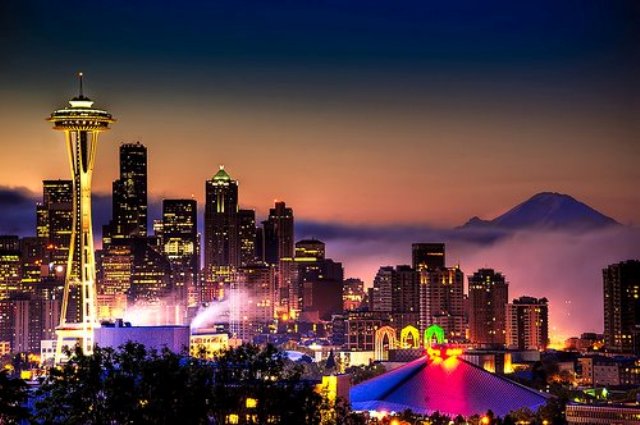 Image Source: Google Image - An image of Seattle at night. The city is on Puget Sound in the Pacific Northwest, is surrounded by water, mountains and evergreen forests, and encompasses thousands of acres of parkland (hence its nickname, "Emerald City").