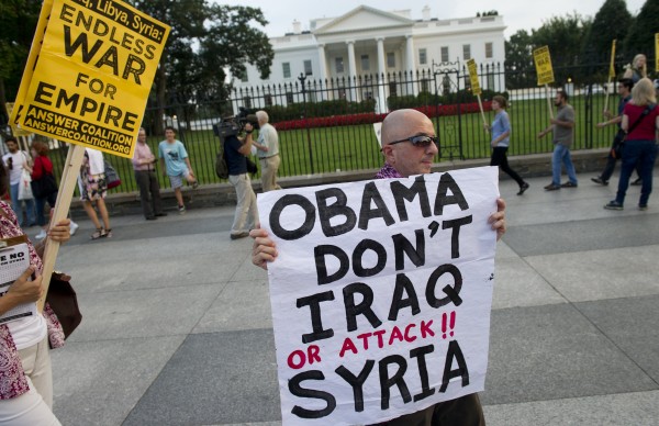 Demonstrators march in protest during a rally against a possible U.S. attack on Syria.