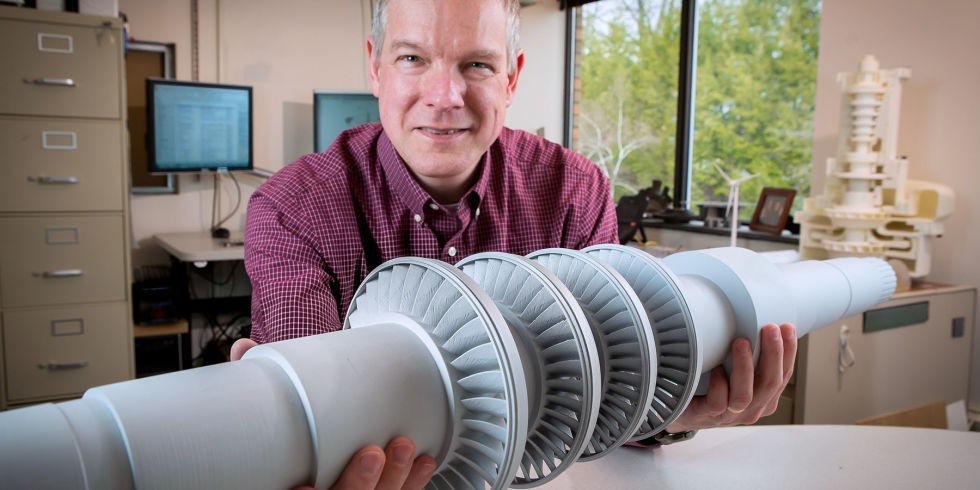 Man Holding Min-Turbine