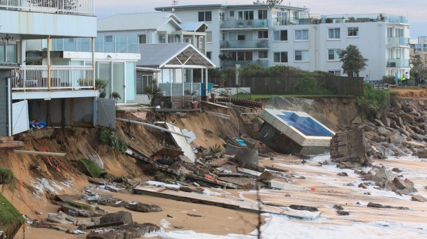 A swimming pool lies on Collaroy Beach in Sydney after a massive storm. Photo: Peter Rae