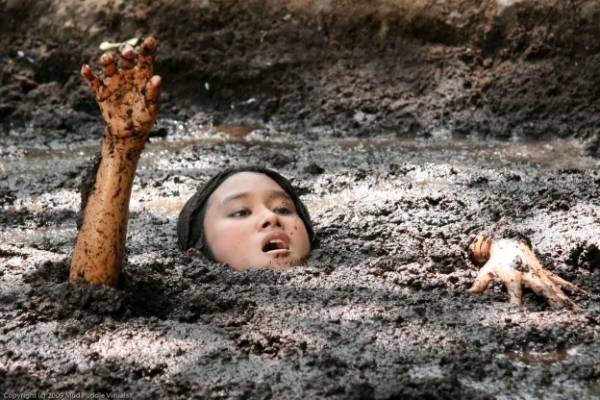 women stuck in sticky quicksand
